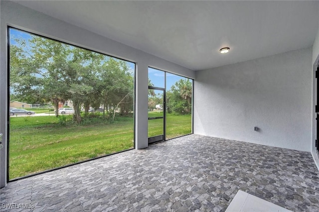 view of unfurnished sunroom