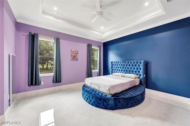 bedroom with crown molding, a raised ceiling, and ceiling fan