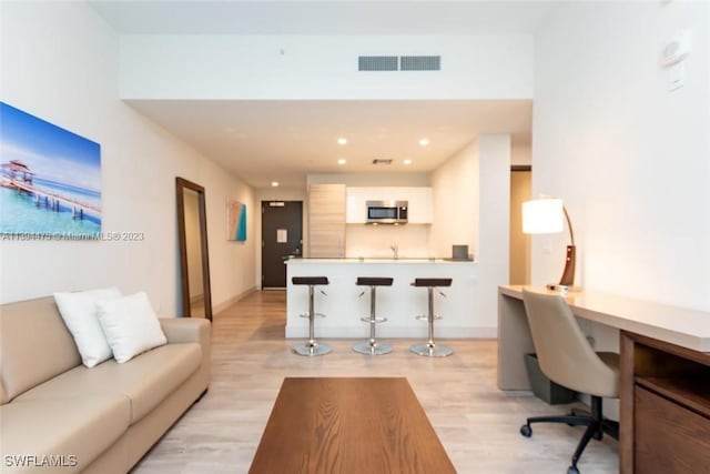 living room featuring light hardwood / wood-style floors