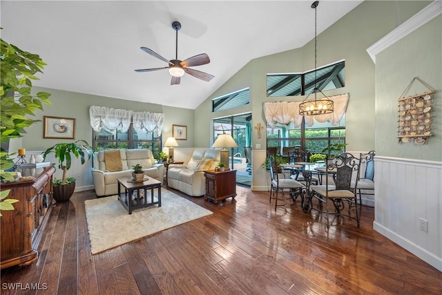 living room featuring high vaulted ceiling, dark hardwood / wood-style floors, and ceiling fan with notable chandelier