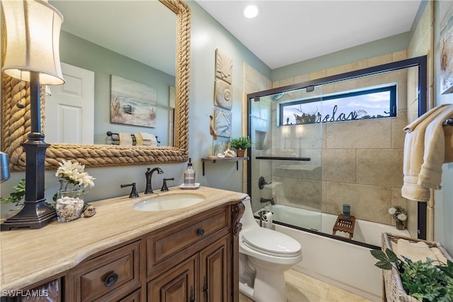 full bathroom with vanity, tile patterned floors, shower / bath combination with glass door, and toilet