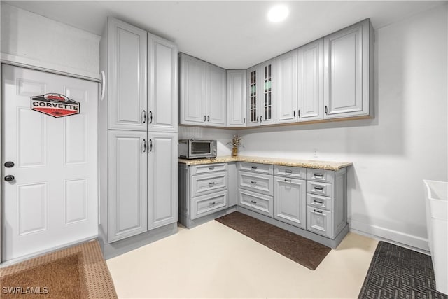 kitchen featuring gray cabinets