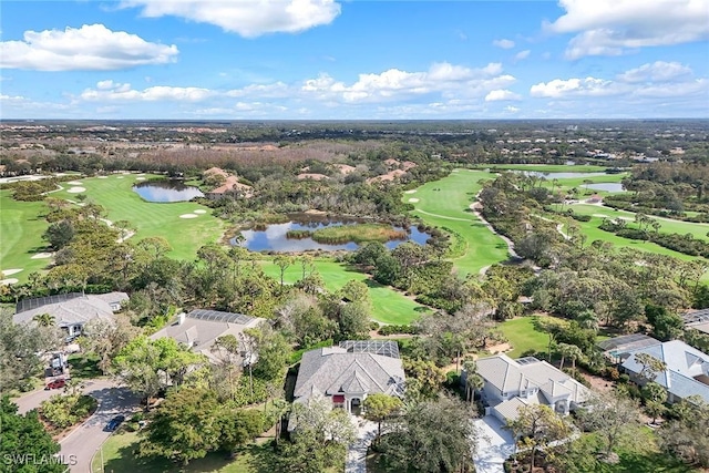 aerial view with a water view and view of golf course