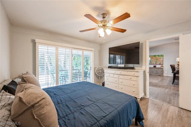 bedroom with ceiling fan and light wood-type flooring