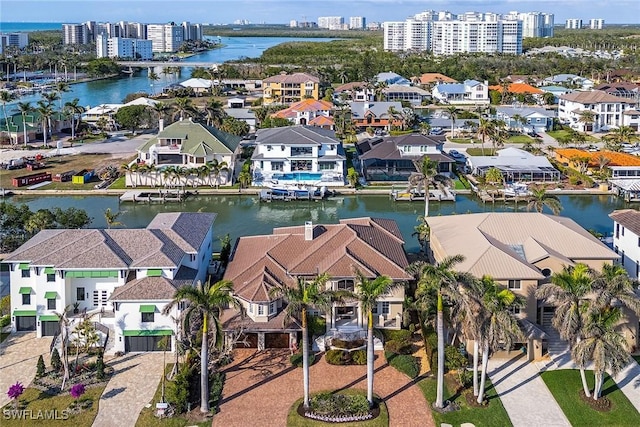 birds eye view of property featuring a water view