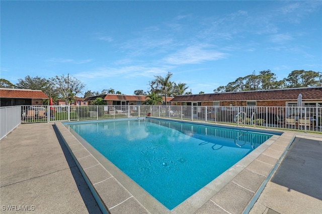 view of swimming pool featuring a patio