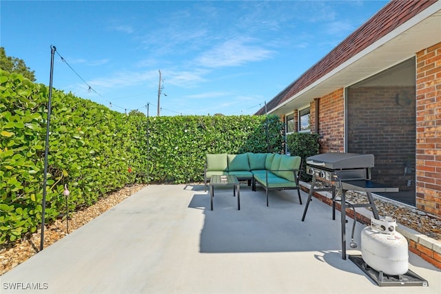 view of patio featuring grilling area and an outdoor hangout area