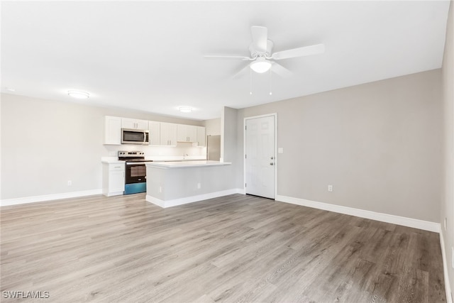 unfurnished living room with light hardwood / wood-style floors and ceiling fan