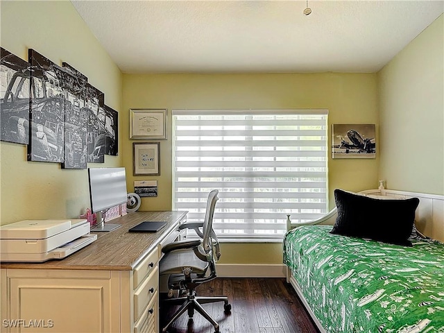 bedroom featuring dark wood-type flooring