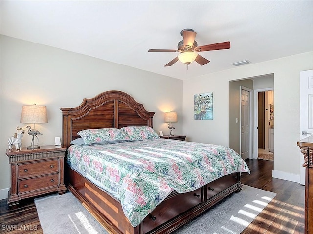 bedroom with ceiling fan and dark hardwood / wood-style floors