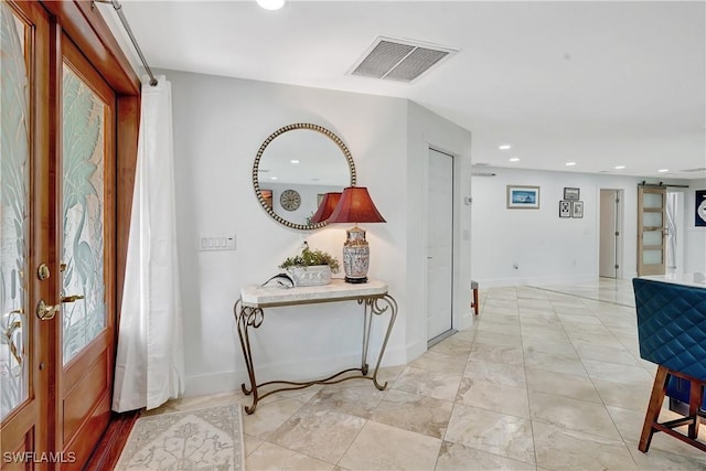 entryway featuring a barn door