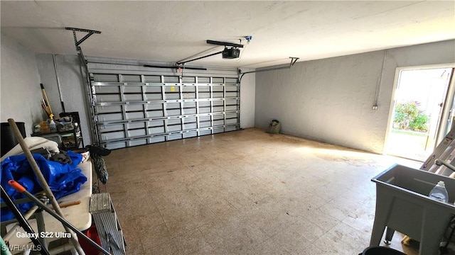 garage featuring a garage door opener