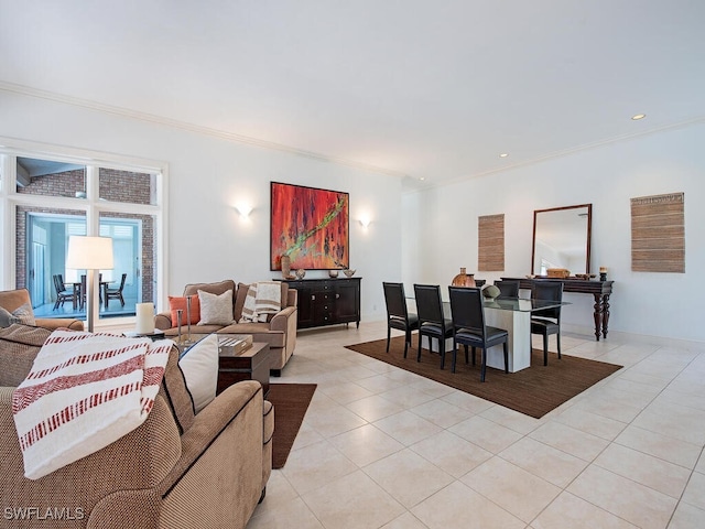 living room featuring ornamental molding and light tile patterned flooring