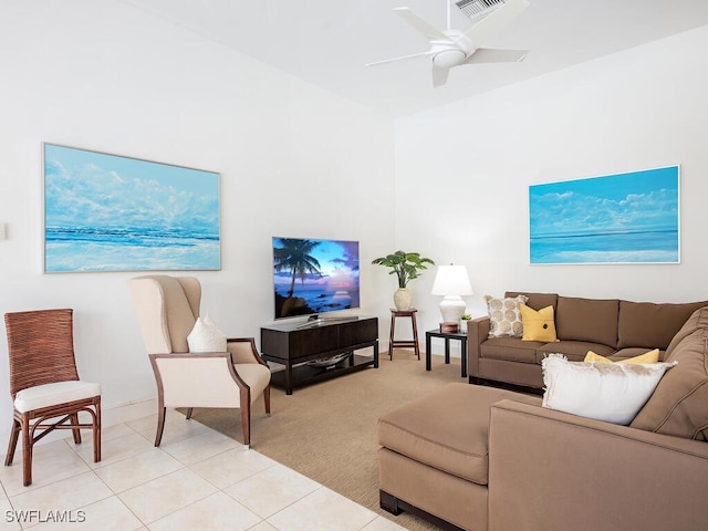 living room featuring light colored carpet and ceiling fan