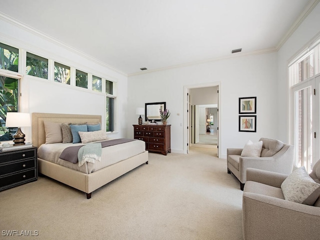 bedroom with crown molding and light colored carpet