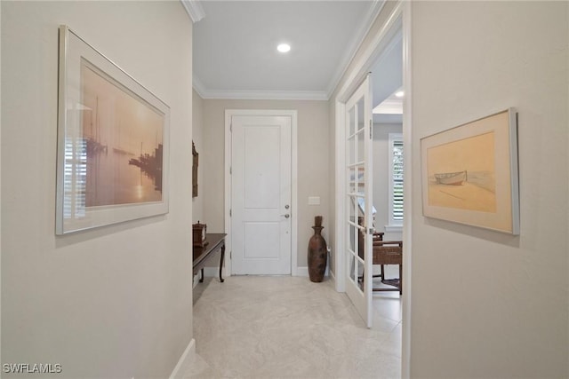 hall featuring ornamental molding