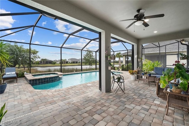 view of pool with a water view, an outdoor hangout area, an in ground hot tub, a patio, and a lanai