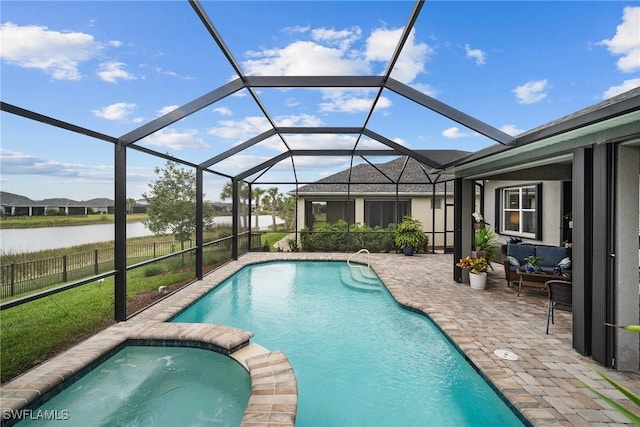 view of swimming pool featuring an in ground hot tub, a patio area, a water view, and glass enclosure