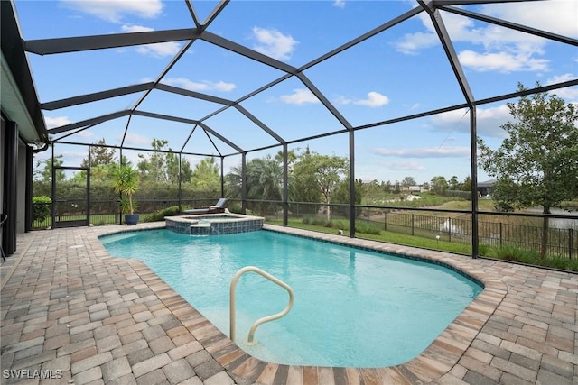 view of swimming pool with an in ground hot tub, a lanai, and a patio area