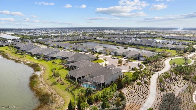 drone / aerial view featuring a water view