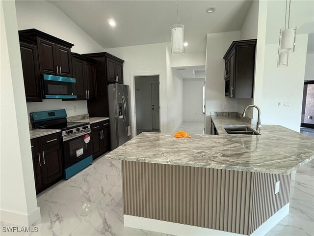 kitchen with appliances with stainless steel finishes, kitchen peninsula, sink, and hanging light fixtures