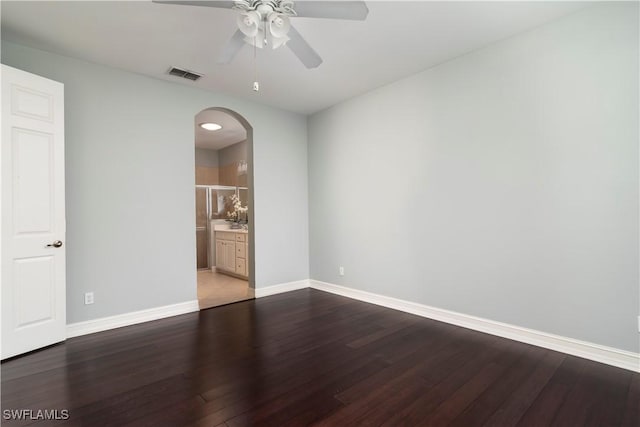 spare room with ceiling fan and hardwood / wood-style floors