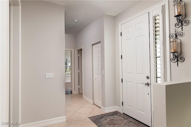 view of tiled foyer entrance