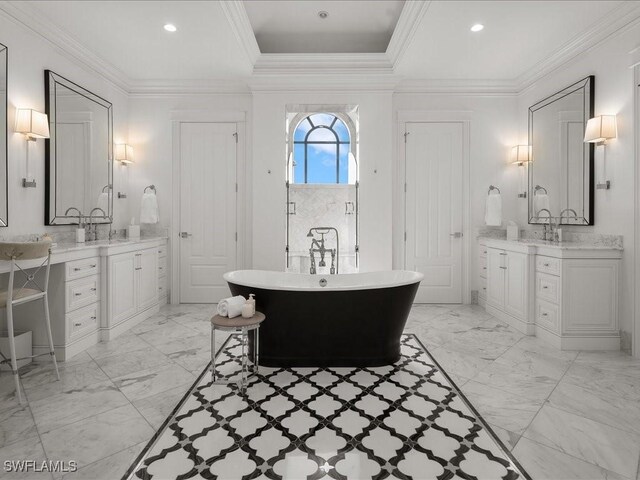 bathroom with vanity, shower with separate bathtub, ornamental molding, and a raised ceiling