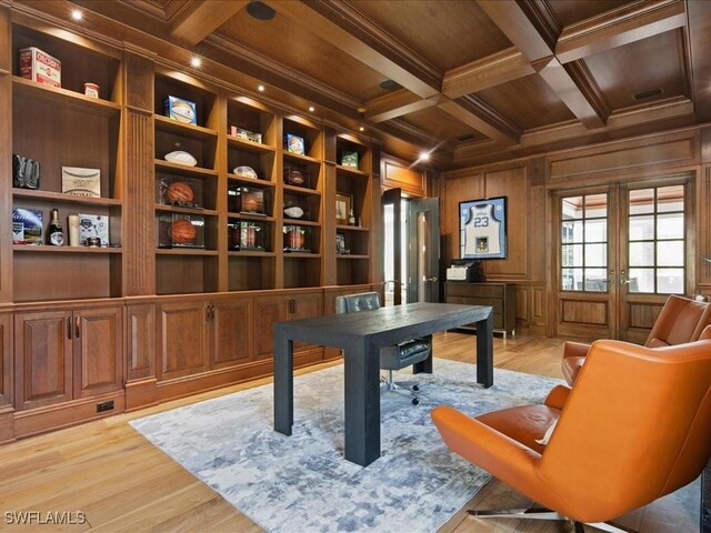 home office with beamed ceiling, crown molding, coffered ceiling, and light hardwood / wood-style floors