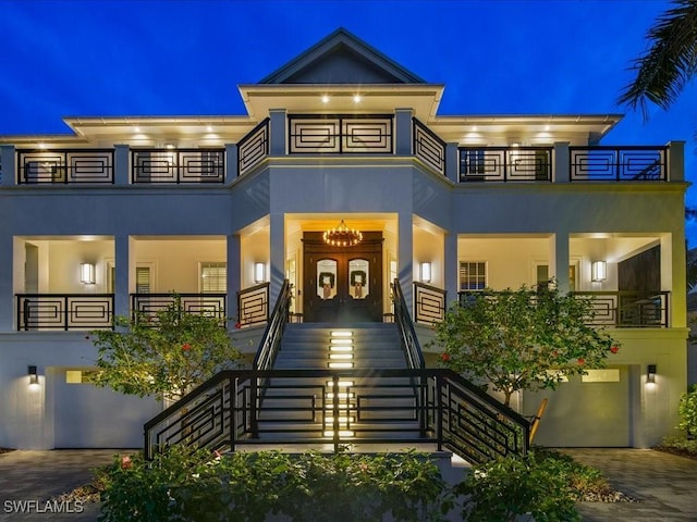 view of front of home with a balcony