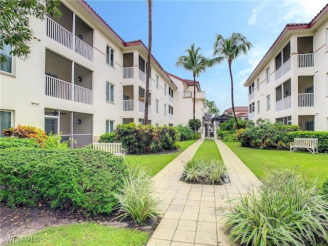 view of community featuring a lawn