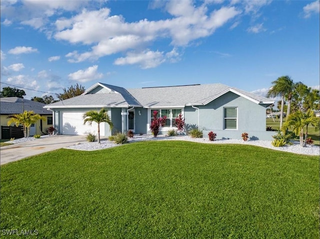 ranch-style home featuring a garage and a front yard