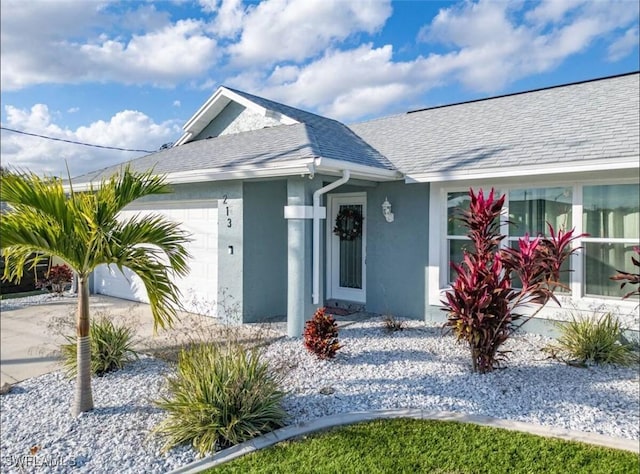 single story home featuring a garage