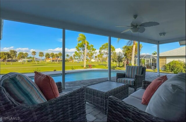 sunroom / solarium with ceiling fan