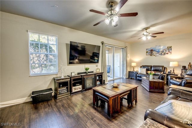 living room featuring dark wood-type flooring