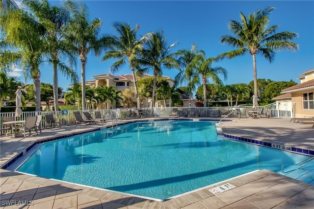 view of swimming pool with a patio area