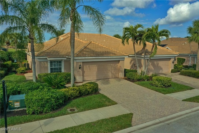 view of front of home featuring a garage