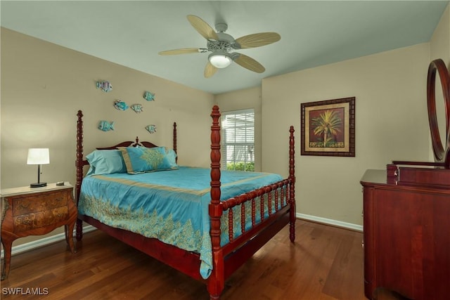 bedroom featuring ceiling fan and dark hardwood / wood-style floors