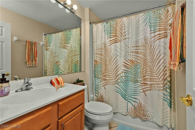 full bathroom with toilet, vanity, and shower / bathtub combination with curtain