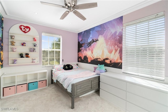 bedroom featuring a ceiling fan, carpet floors, and crown molding