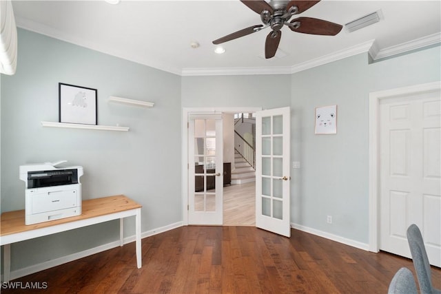unfurnished office featuring french doors, visible vents, ornamental molding, and a ceiling fan