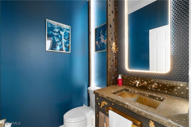 15881 Delasol Ln, Naples, FL 34110 - bathroom with vanity and toilet