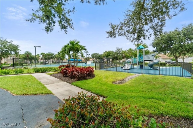 15881 Delasol Ln, Naples, FL 34110 - surrounding community with a tennis court