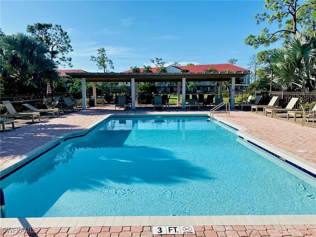 4572 Andover Way Unit C102, Naples, FL 34112 - community pool with fence, a gazebo, and a patio area