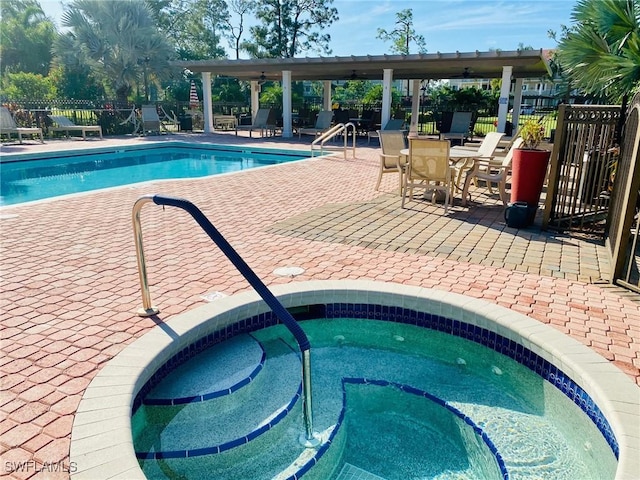 4572 Andover Way Unit C102, Naples, FL 34112 - pool featuring a community hot tub, fence, and a patio