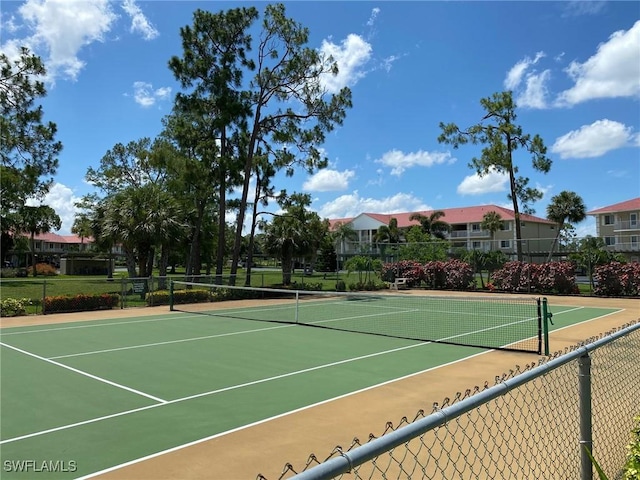 4572 Andover Way Unit C102, Naples, FL 34112 - view of tennis court with fence and community basketball court
