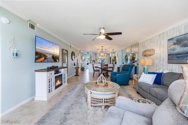 4572 Andover Way Unit C102, Naples, FL 34112 - living room featuring light tile patterned flooring, crown molding, visible vents, and ceiling fan with notable chandelier