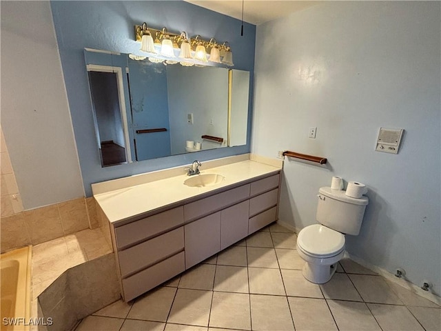 bathroom featuring tile patterned floors, vanity, and toilet