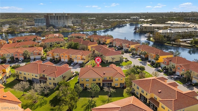 drone / aerial view featuring a water view