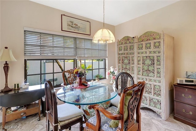 dining room with light tile patterned flooring